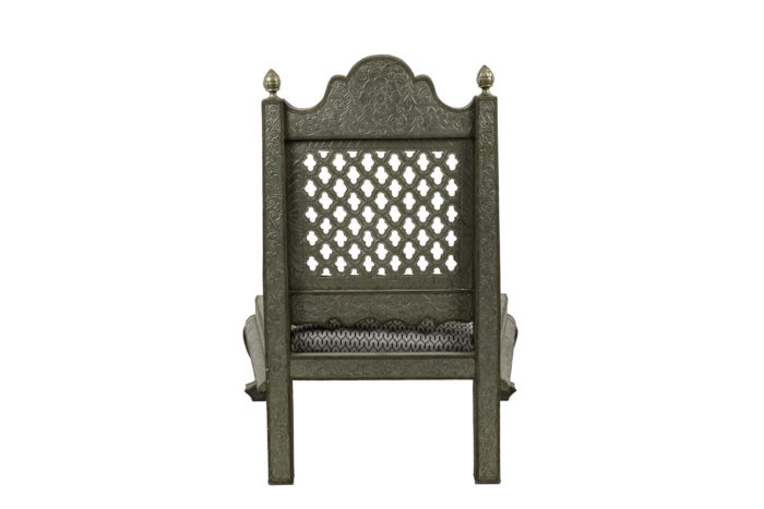 moorish style fireside chairs embossed metal back