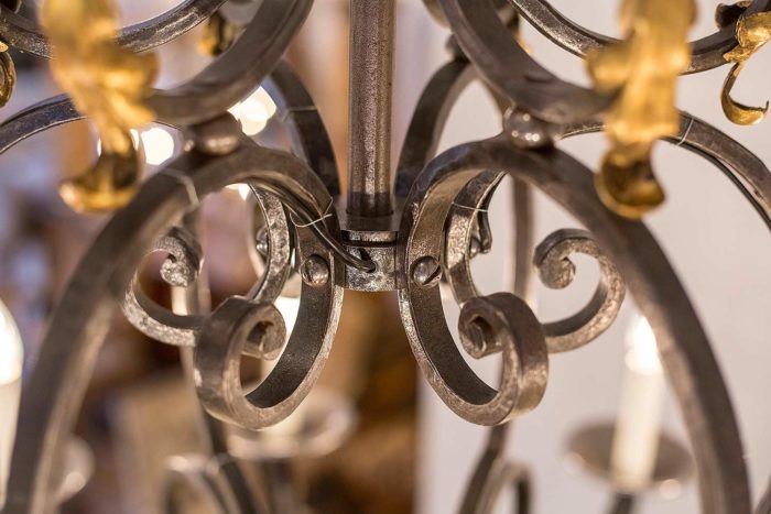 wrought iron poillerat chandelier gold detail