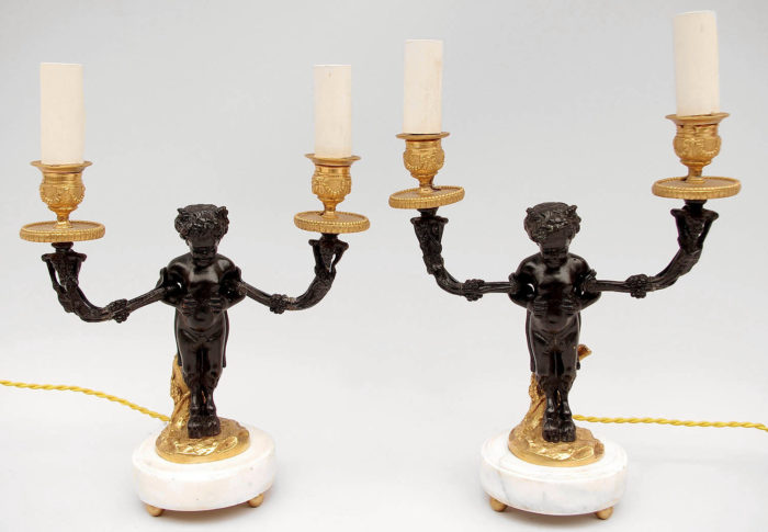 pair louis xvi style satyr candlesticks
