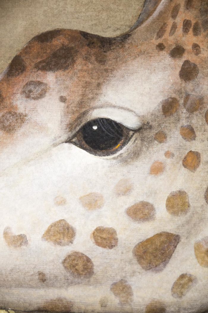 toile peinte girafe oeil noir