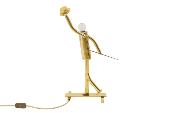 Lampe représentant un danseur de music hall en bronze doré, de profil