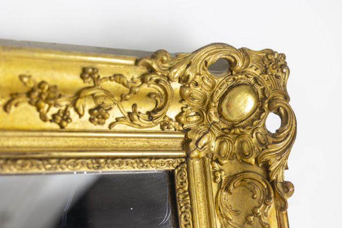 Mirror trumeau Regency style in gilded wood, 19th century - décor de fleurs et cartouches