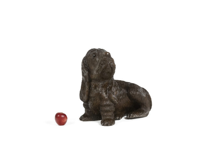 Carved basswood dog, Black Forest style. Circa 1900. - ladder