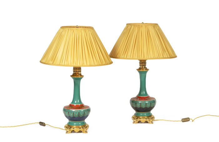 Pair of lamps in porcelain of Paris and gilded bronze. Circa 1850.