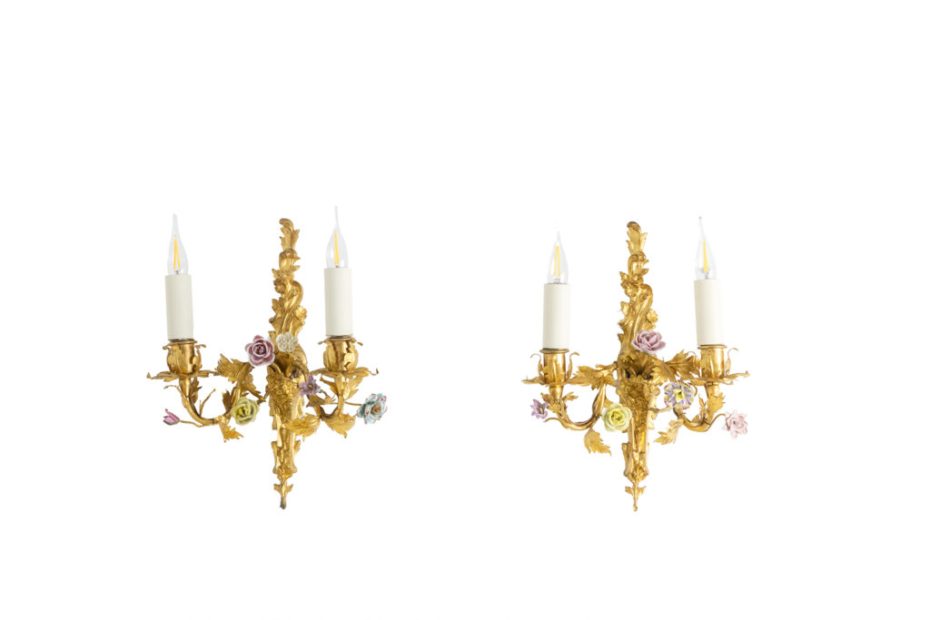 Pair of bronze sconces decorated with flowers. Circa 1880.