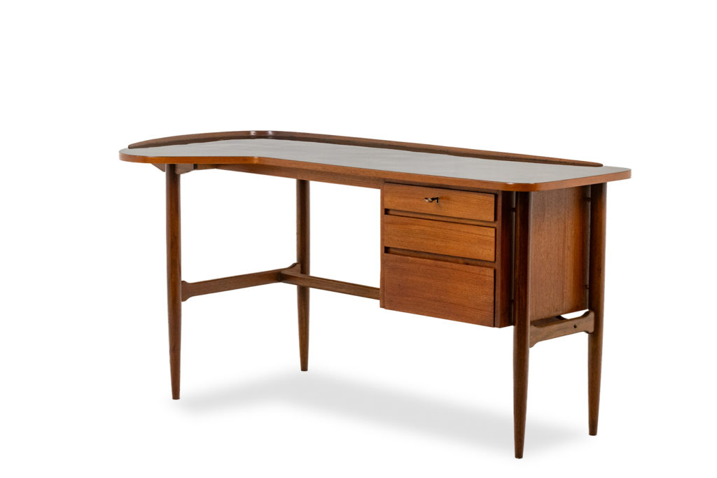 Free-form teak desk. 1950s.