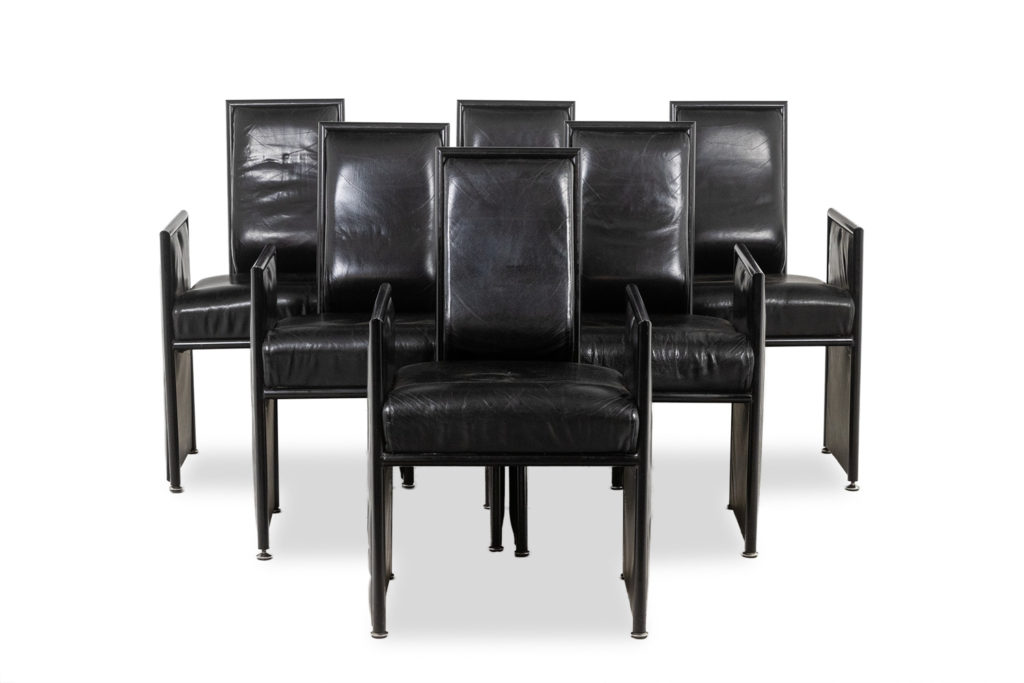 Set of 6 chairs upholstered in black leather. 1980s.